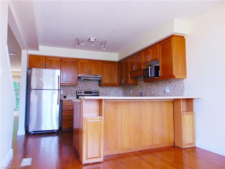 Property Photo:  214 Snowdrop Crescent  ON N2E 4C2 