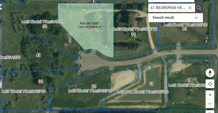 Property Photo: 61 Bearspaw Heights Place AB T3R 1C4