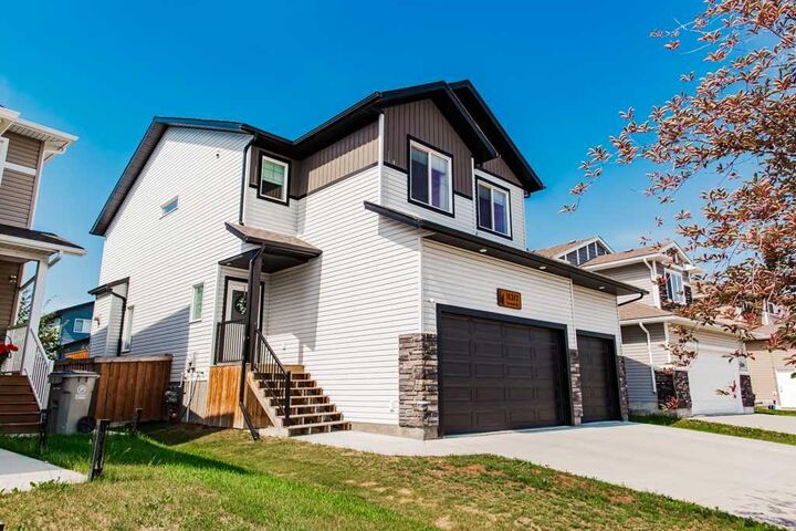 Property Photo: 11317 Tamarack Drive AB T8W 0L1