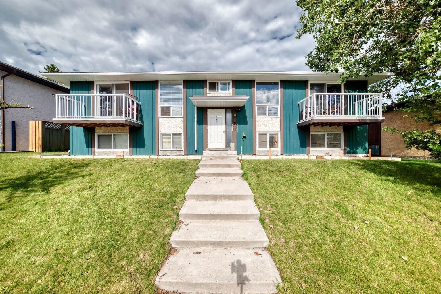 Property Photo:  11415 8 Street SW 1  AB T2W 2N4 