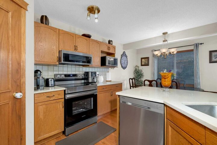 Property Photo:  373 Bridlewood Avenue SW  AB T2Y 4H5 