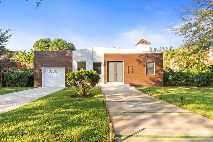 Property Photo:  665 NE 117th St  FL 33161 