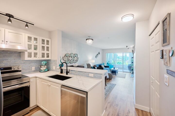 Property Photo: 155 E 3rd Street 305 BC V7L 1E5