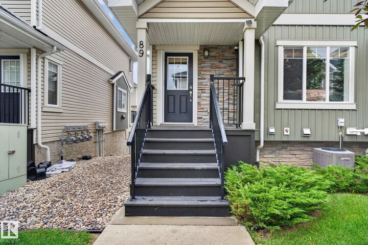 Property Photo:  9535 217 Street NW 89  AB T5T 4P5 