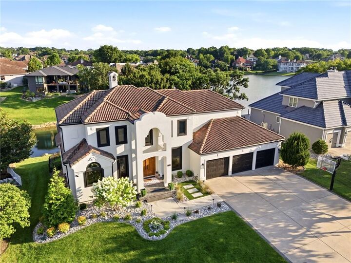 Property Photo:  701 NE Shoreline Drive  MO 64064 