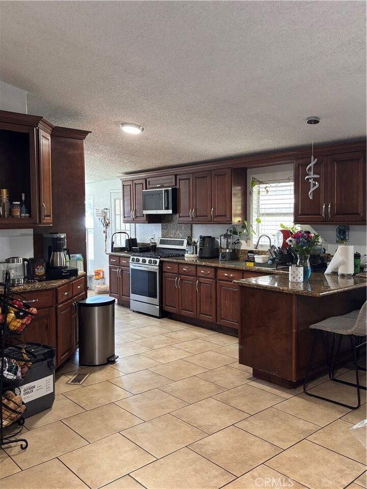 Property Photo: 1855 E Riverside Drive E 209 CA 91761