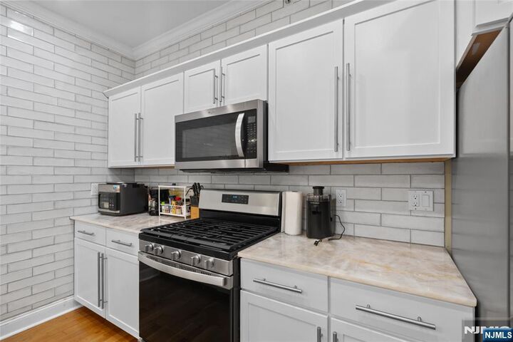 Property Photo:  5501 Hudson Avenue 407  NJ 07093 
