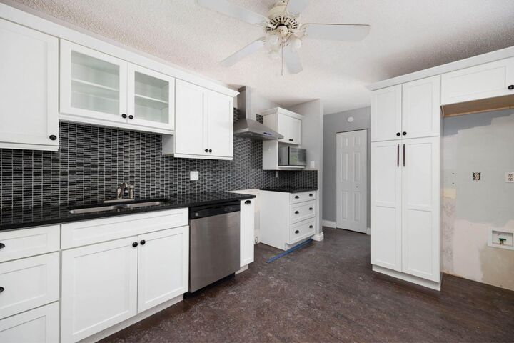 Property Photo: 2 Moberly Crescent AB T9H 1G9