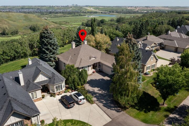 Property Photo:  33 Ridge Pointe Drive  AB T1S 4H1 