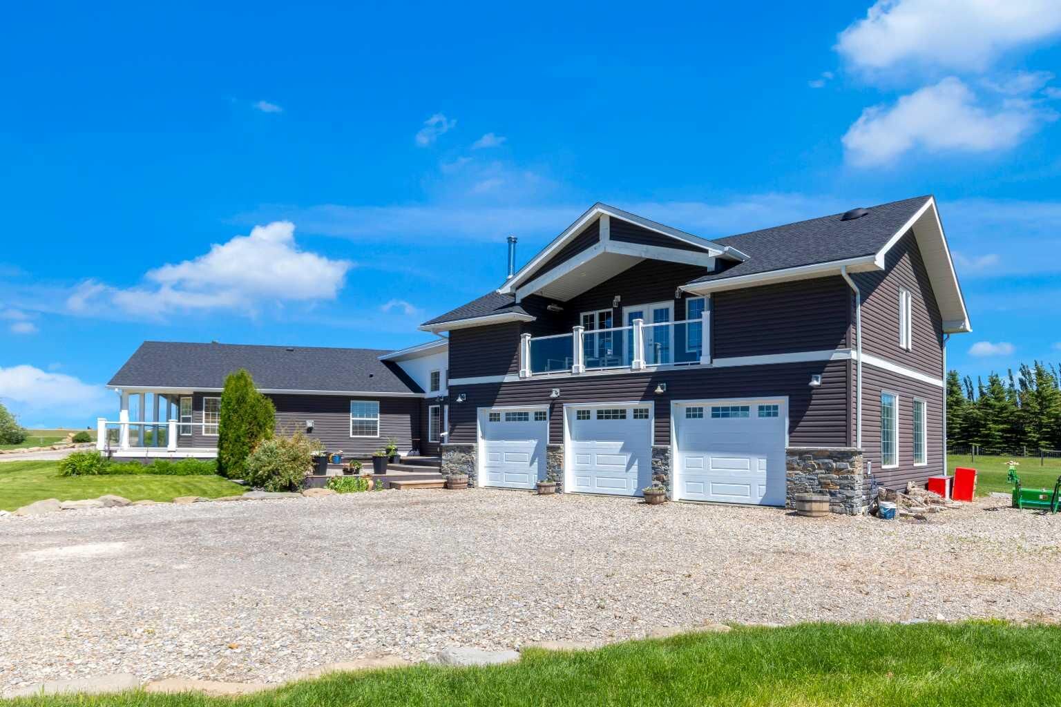Property Photo: 27 Stewart Road SE AB T4A 3H8