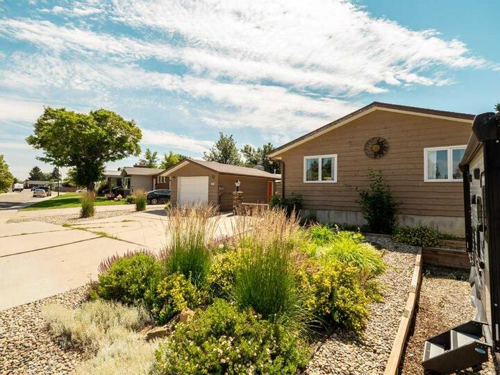 Property Photo: 66 Pheasant Road N AB T1H 4X4