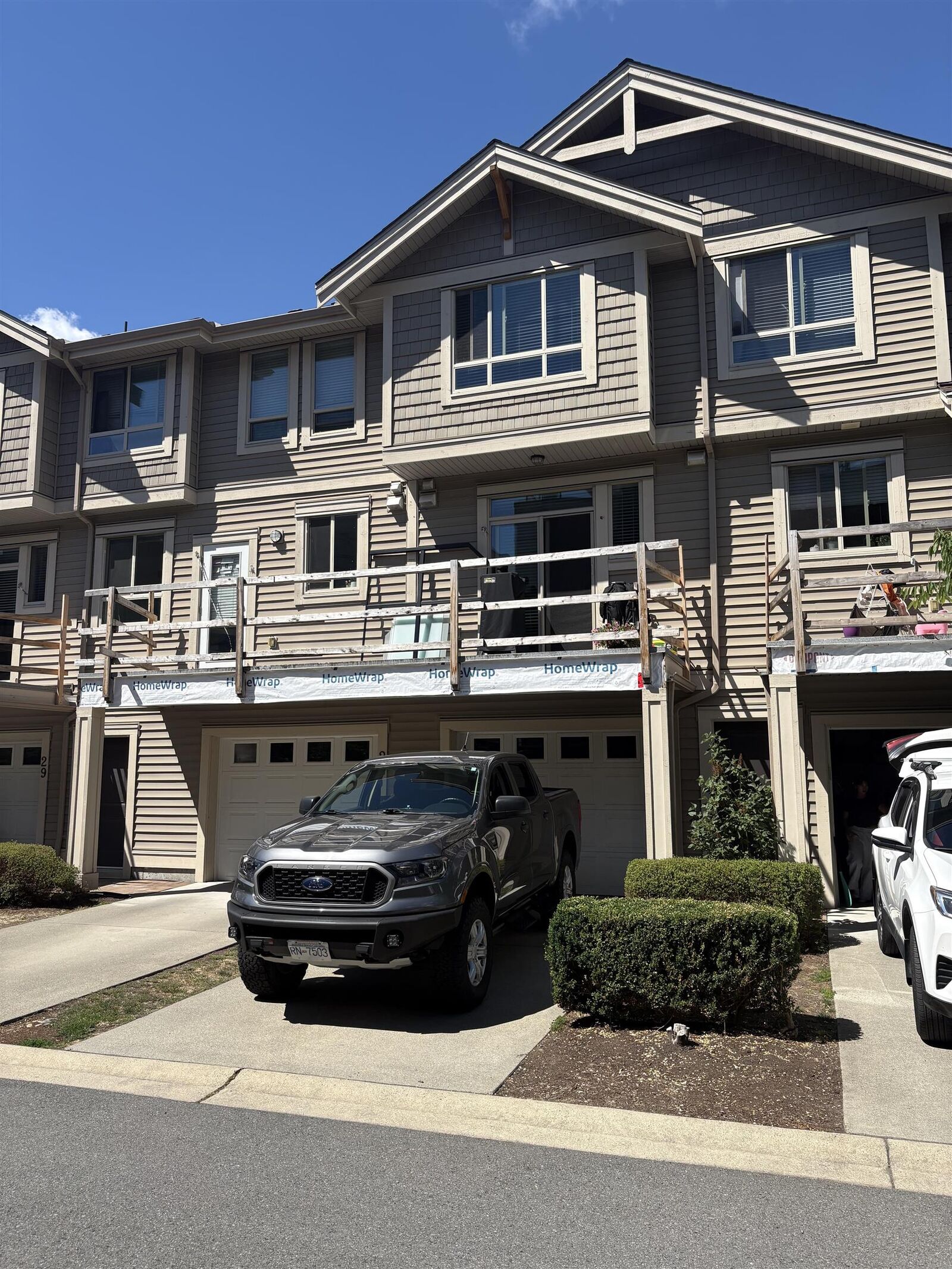 Property Photo: 19752 55A Avenue 27 BC V3A 3X2