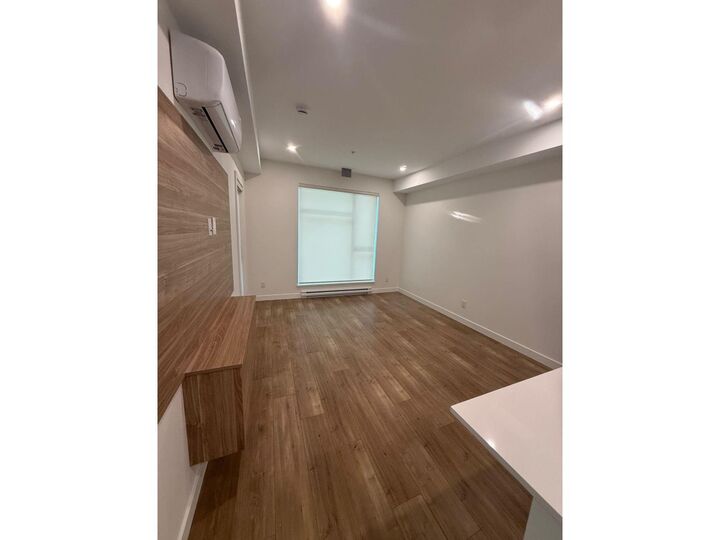 Property Photo: 14398 60 Ave Street 213 BC V3X 2N5