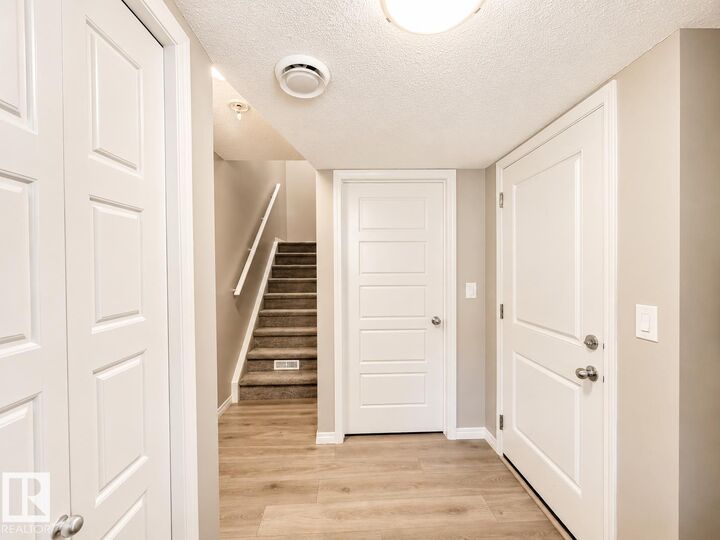 Property Photo:  20104 19 Avenue NW  AB T6M 0X9 