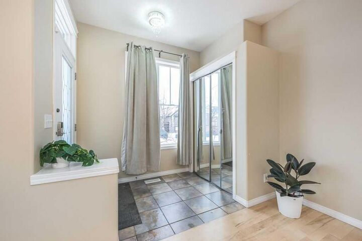 Property Photo:  1005 New Brighton Gardens SE  AB T2Z 0Y1 