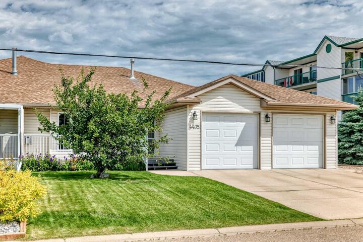 Property Photo: 4405 48 Street AB T4G 1P3