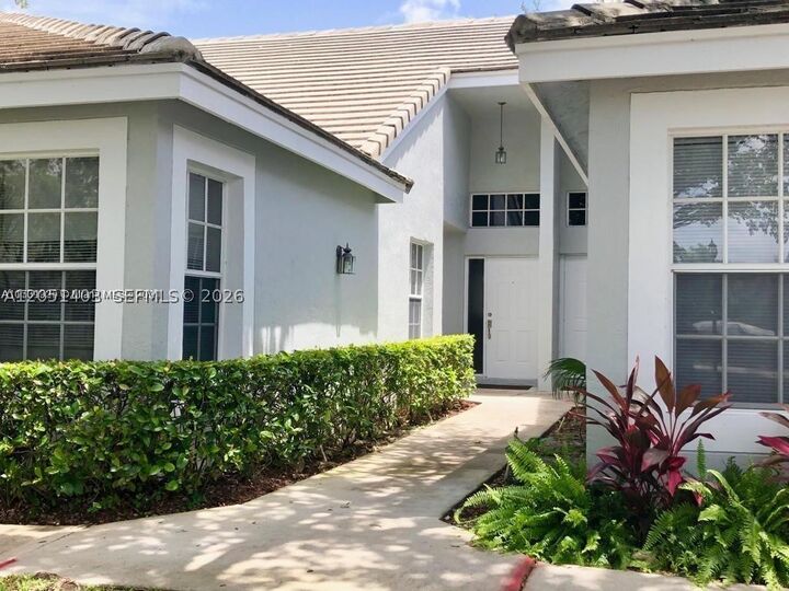 Property Photo: 8723 Forest Hills Blvd FL 33065