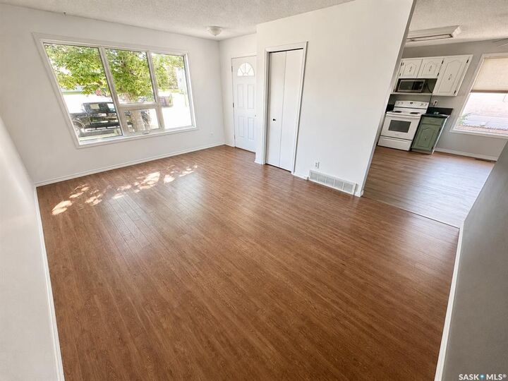 Property Photo: 213 18th Street NE SK S4H 3J4