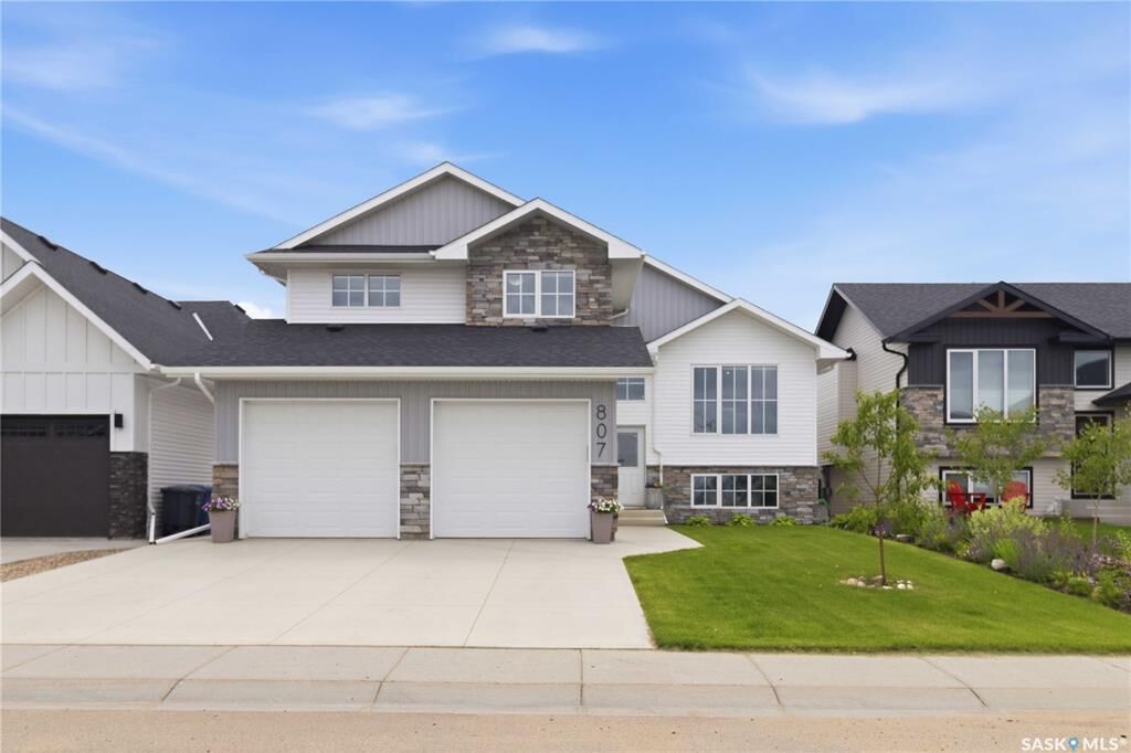 Property Photo: 807 Weir Crescent SK S0K 4S4