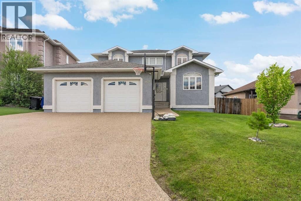 Property Photo:  169 Lindstrom Crescent  AB T9K 2N8 