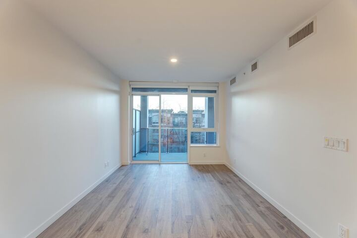 Property Photo:  10448 University Drive 4xx  BC V3T 0S7 