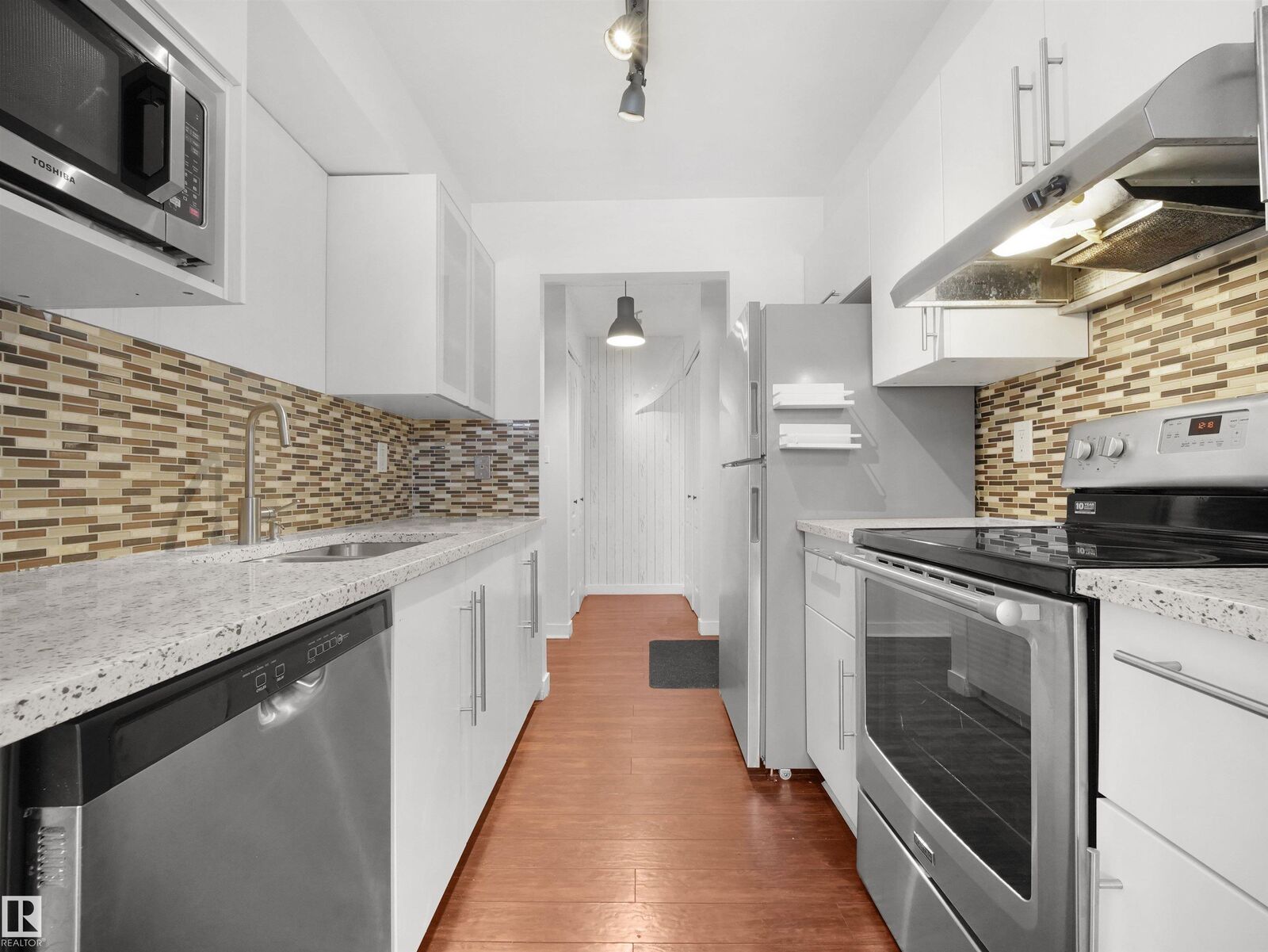 Property Photo: 7403 171 Street NW 201 AB T5T 2R1