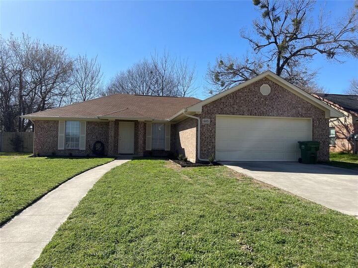 Property Photo:  605 N Avenue D  TX 76082 