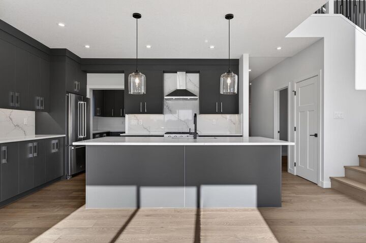 Property Photo: 709 Dawson Common AB T1X 1Z7