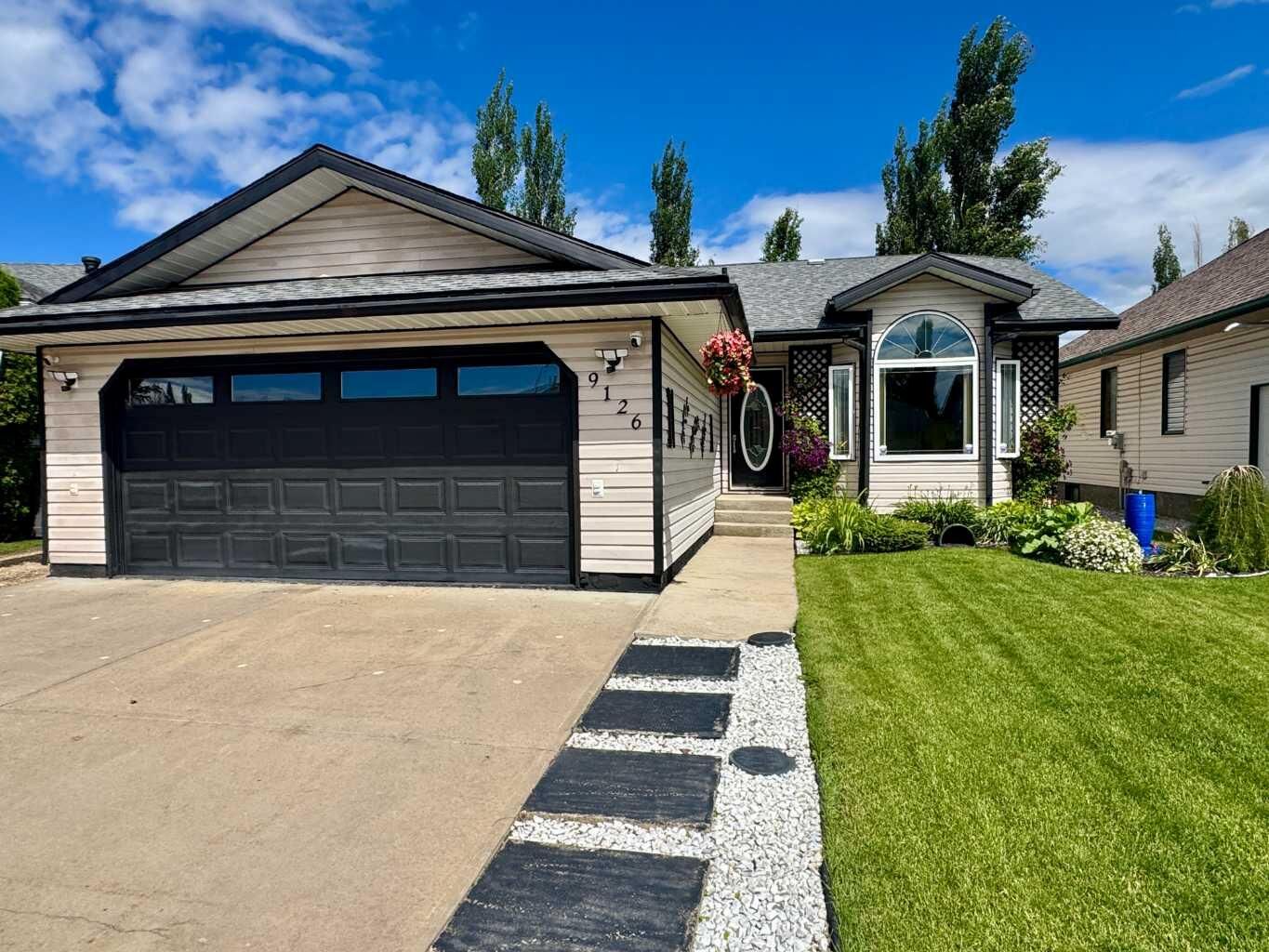 Property Photo:  9126 117 Avenue  AB T8X 1J2 