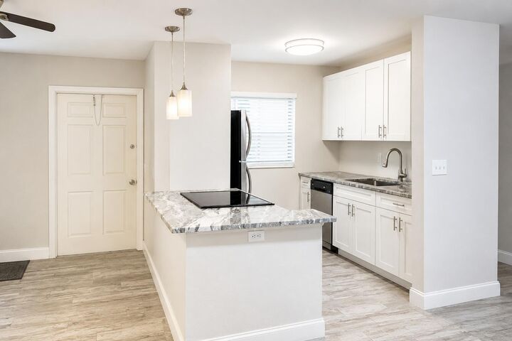 Property Photo:  115 SW 1st Avenue 9  FL 33435 