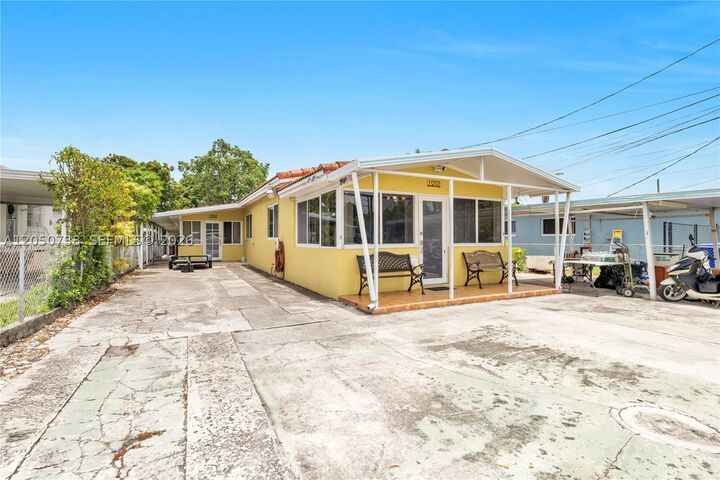 Property Photo:  1052 NW 25th Ave  FL 33125 