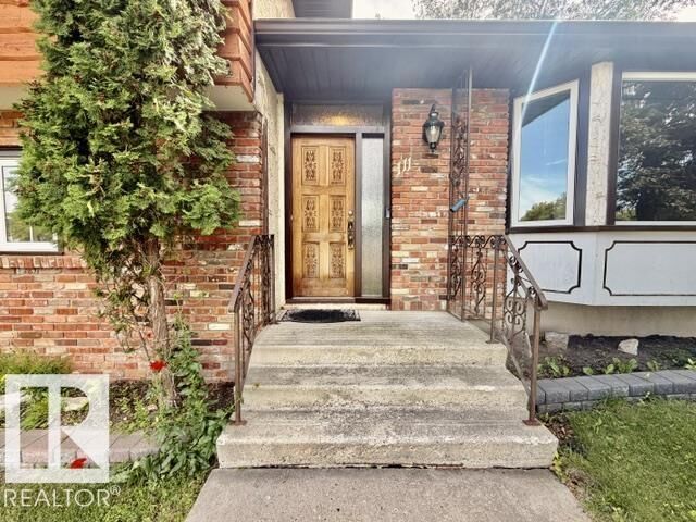 Property Photo: 111 Green Ash Drive AB T9A 2H7