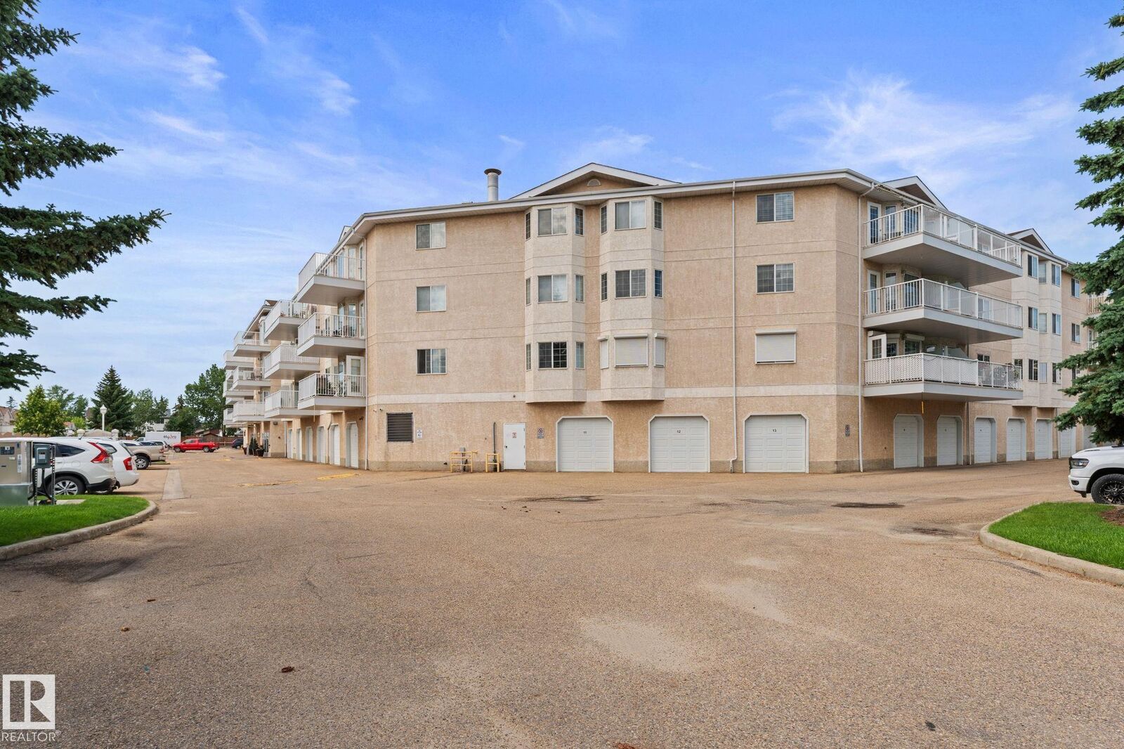 Property Photo: 13441 127 Street NW 243 AB T5L 4B6