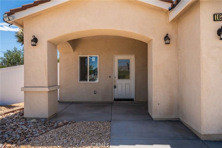 Property Photo:  16277 Puesta Del Sol  CA 92394 