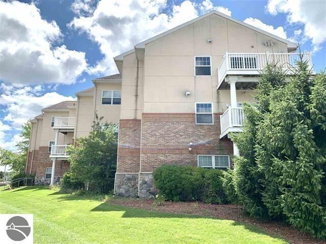 Property Photo:  301 N Lake Street 206  MI 49601 