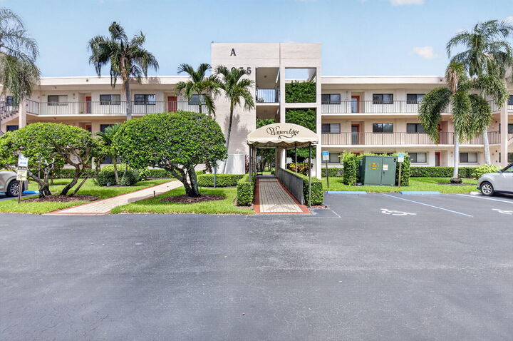 Property Photo:  15075 Witney Road 213  FL 33484 