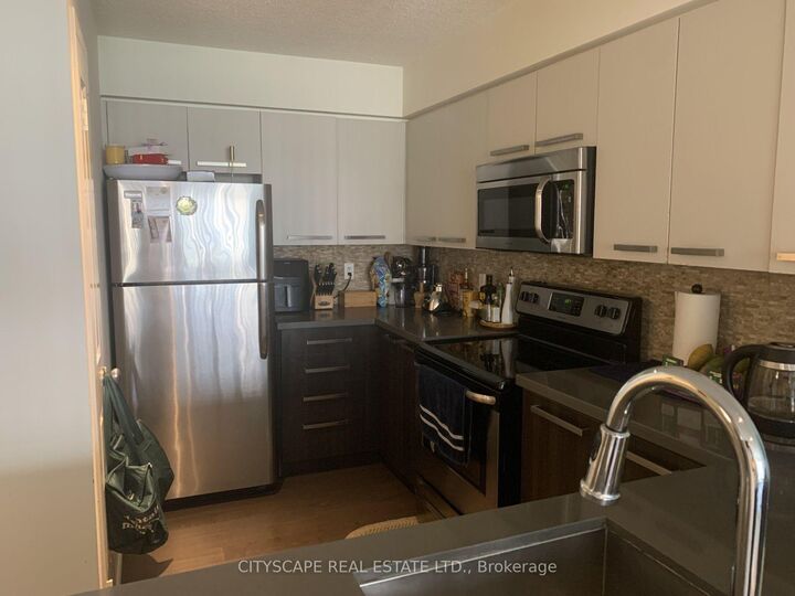 Property Photo:  11 St Joseph Street 1210  ON M4Y 1J8 