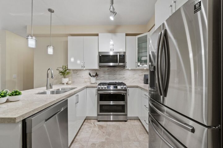 Property Photo: 20376 86 Avenue 208 BC V2Y 3P8