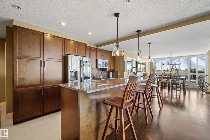 Property Photo: 1350 Windermere Way SW 405 AB T6W 2J3