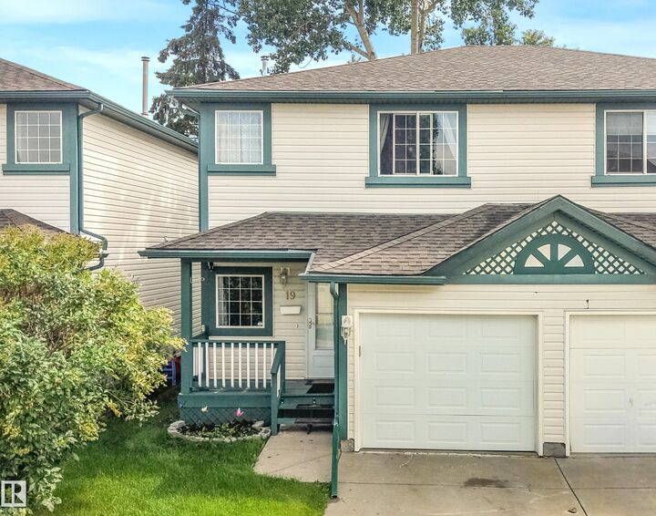 Property Photo: 15215 126 Street NW 19 AB T5X 2Z3