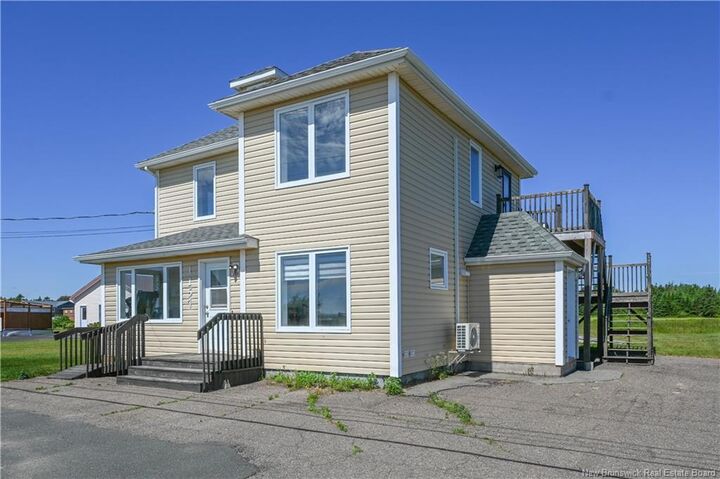 Property Photo: 1157 De La Mer Boulevard NB E8T 1V8