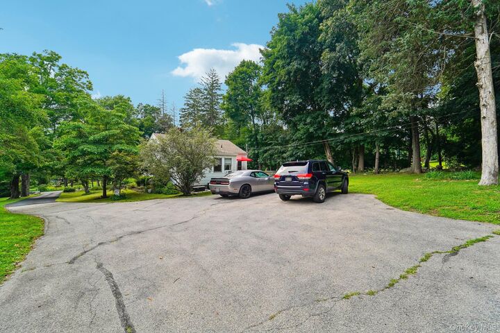 Property Photo: 77 Baron De Hirsch Road NY 10517
