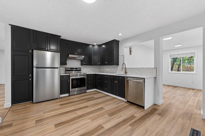 Property Photo: 1091 Berkley Drive NW AB T3K 1S6