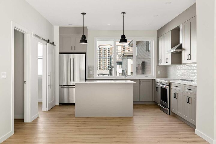 Property Photo: 1453 Naa Drive SW 414 AB T3H 6H7