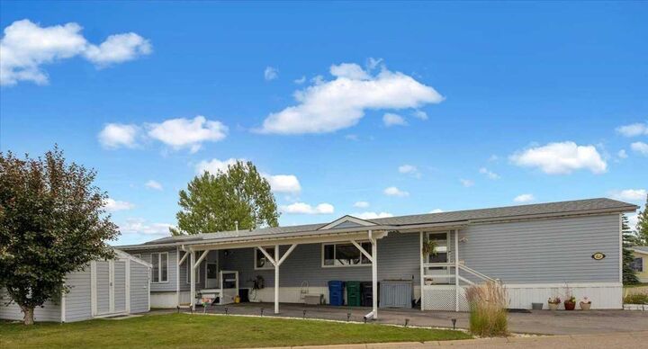 Property Photo: 99 Arbour Lake Drive 62 AB T3G 4E4