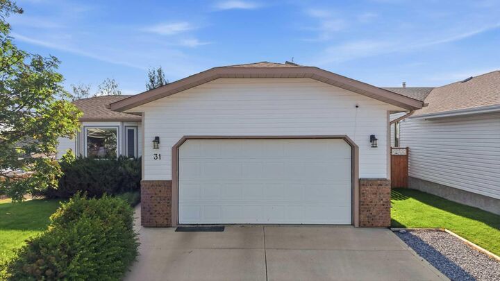 Property Photo: 31 Palmer Close AB T4S 1K3
