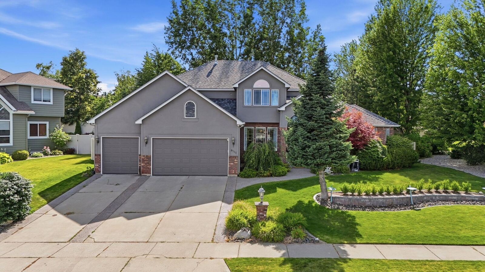 Property Photo: 9111 N Kensington Dr WA 99208