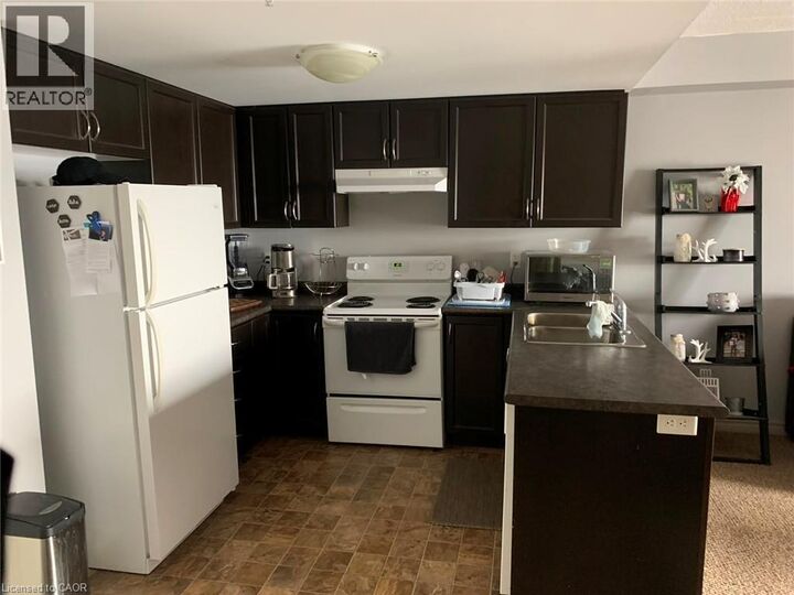 Property Photo: 67 Kingsbury Square 213 ON N1L 0L3