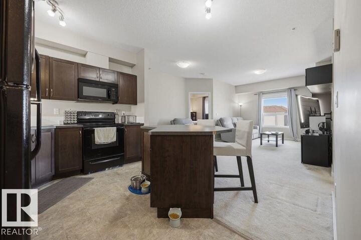Property Photo: 13835 155 Avenue NW 321 AB T6V 0B7