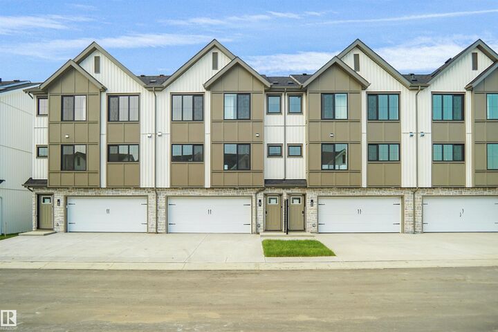 Property Photo: 17319 5 Street NE 67 AB T5Y 4G1